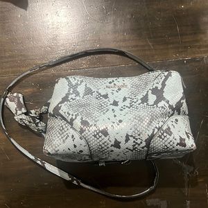 Small light blue Nine West over shoulder purse.